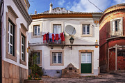 Laundry and architecture in Estoi, Portugal Photograph by Tatiana Travelways