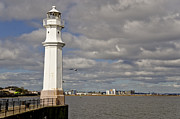 Lighthouse on a sunny day. Photograph by Elena Perelman