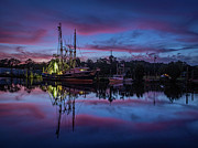Pink Clouds Frame a Shrimp Boat Photograph by Brad Boland