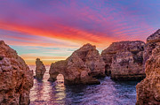 Red morning on Ponta da Piedade Photograph by Dmytro Korol