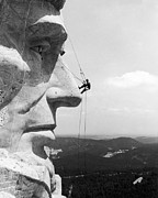 Scaling Mount Rushmore Photograph by Granger