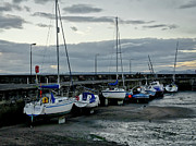 Seven boats in the coming night. Photograph by Elena Perelman