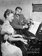 Singing Couple In 19th Century Dress Photograph by Debrocke/ClassicStock