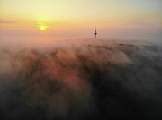 Sunrise and morning fog warm orange light Photograph by Matthias Hauser
