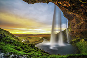 Sunset over the famous Seljalandsfoss Waterfall  in Iceland Photograph by Miroslav Liska
