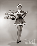 Woman In Sexy Santa Outfit, C.1960s Photograph by H. Armstrong Roberts/ClassicStock