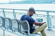 Young African American Man working on laptop computer outdoor in New York 17061834 Photograph by Alexander Image