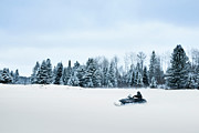 Man Riding Snowmobile On Landscape Against Sky #1 Photograph by Cavan Images
