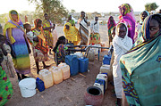 Refugees Collecting Water #1 Photograph by Science Photo Library