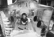 Baby David Plays In His Plastic Bubble Photograph by Bettmann