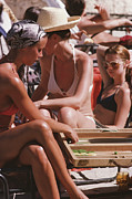 Backgammon By The Pool Photograph by Slim Aarons
