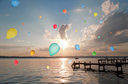 Balloons Floating Over Still Lake Photograph by Henglein And Steets