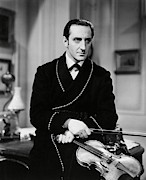 BASIL RATHBONE in THE HOUND OF THE BASKERVILLES -1939-. Photograph by Album