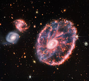 Cartwheel Galaxy And Companion Galaxies Photograph by Science Photo Library