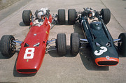 Chris Amon And Jackie Stewart At The Photograph by Heritage Images