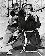CLINT EASTWOOD and SHIRLEY MACLAINE in TWO MULES FOR SISTER SARA -1970-. Photograph by Album