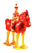 Clown Riding Red and Yellow Horse Drawing by CSA Images