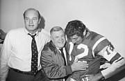 Coach Weeb Ewbank Hugs Joe Namath Photograph by Bettmann