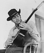 DEAN MARTIN in THE SONS OF KATIE ELDER -1965-. Photograph by Album