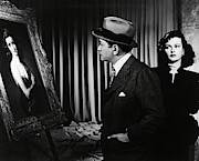 EDWARD G. ROBINSON and JOAN BENNETT in THE WOMAN IN THE WINDOW -1944-. Photograph by Album