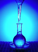Fluid Running From Funnel Into Flat Bottom Flask Photograph by Science Photo Library