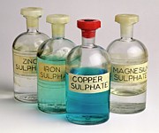 Four Bottles Of Sulphate Solutions Photograph by Science Photo Library