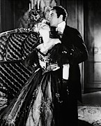 GRETA GARBO and ROBERT TAYLOR in CAMILLE -1936-. Photograph by Album