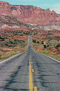 Highway Leading To Mountain Range Photograph by Dreampictures