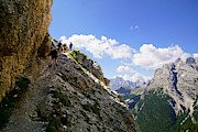 Hikers on steep trail up Monte piana Photograph by Steve Estvanik