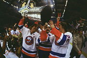 Hockey Players Carrying Trophy Photograph by Bettmann