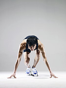Male Runner In Starting Blocks Photograph by Ting Hoo
