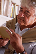 Man Reading Photograph by Science Photo Library