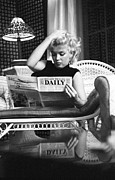 Marilyn Relaxes In A Hotel Room Photograph by Michael Ochs Archives