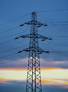 Power Line Mast Against The Background Of The Sunset Sky Photograph by Cavan Images