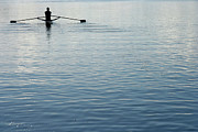 Rear View Of A Man Rowing A Boat Photograph by Ggwink