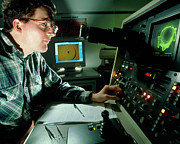 Researcher Viewing Impact Crater Under Sem Photograph by Science Photo Library