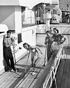Shuffleboard Players Photograph by George Marks