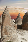 Sunset on fairy chimney balanced rock formations Photograph by Steve Estvanik