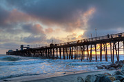 Sunset Through Oceanside Pier Photograph by Chris Moyer