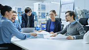 Team Of Engineers Having A Meeting Photograph by Science Photo Library