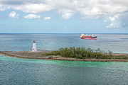 The Lighthouse and the Freighter Photograph by Kristia Adams