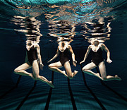 Three Synchronised Swimmers In Line Photograph by Henrik Sorensen