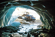 View Of Helicopter Landed Outside Of A Glacial Cave. Photograph by Cavan Images