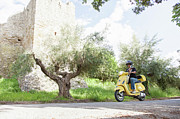 Woman On Scooter Riding Around Corner Photograph by Stefanie Grewel