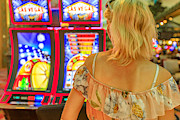 Woman slot machines Photograph by Benny Marty Woman slot machines Photograph by Benny Marty