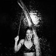 Woman Taking A Cold Shower From Ice Bucket Photograph by Science Photo Library