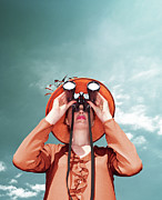 Young Woman Looking Through Binoculars Photograph by Gandee Vasan