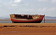 18/07/13 MORECAMBE. Boat on the shore. Photograph by Lachlan Main