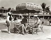 1930s 1940s 3 Women Bathing Suits Single Man Casual Clothes Sitting Talking Under Pool Side Umbrella Photograph by Panoramic Images 1930s 1940s 3 Women Bathing Suits Single Man Casual Clothes Sitting Talking Under Pool Side Umbrella Photograph by Panoramic Images