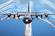 AC-130H Spectre jettisons flares Photograph by US Air Force